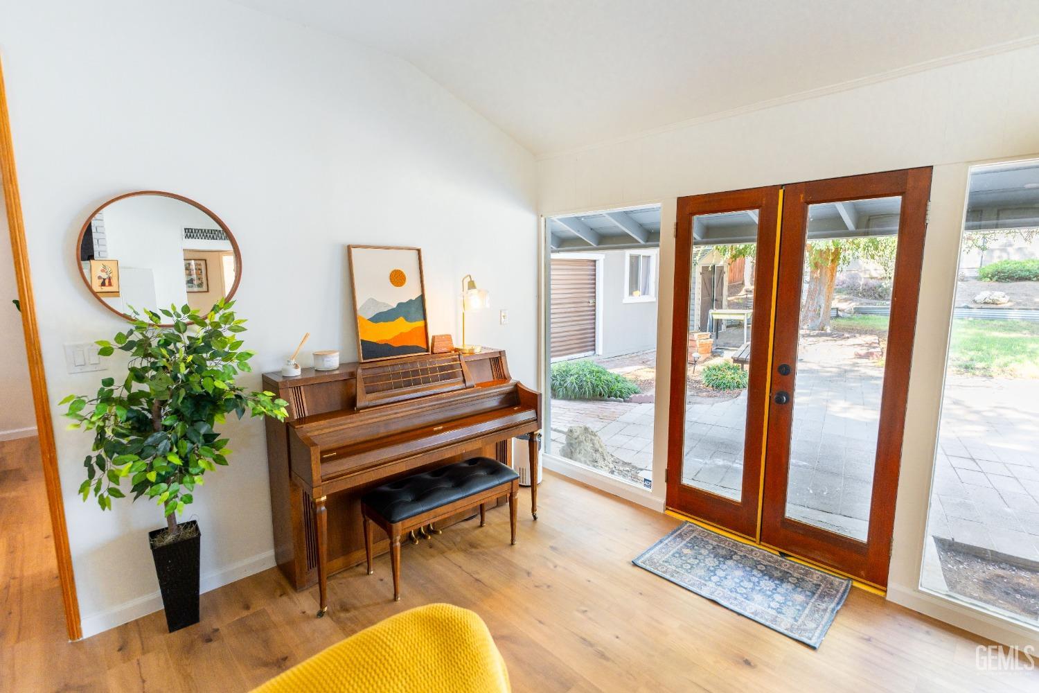 Undisclosed Address Bakersfield, CA 93306 - Photo 5 of 20 a living room with furniture and a potted plant