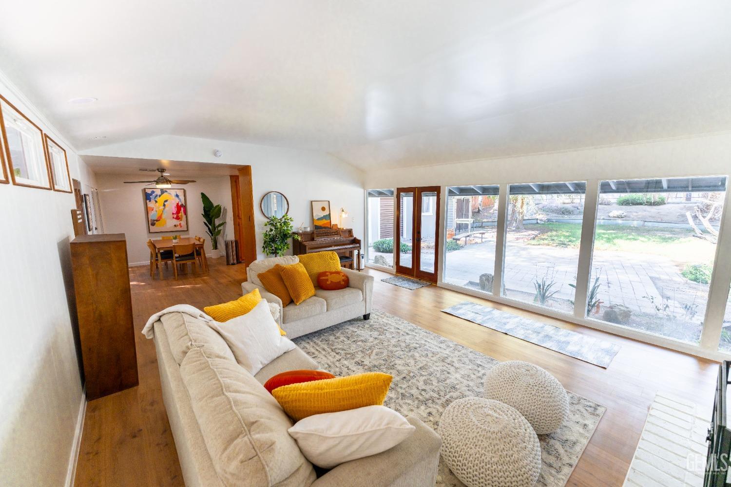 Undisclosed Address Bakersfield, CA 93306 - Photo 6 of 20 a living room with furniture and a large window
