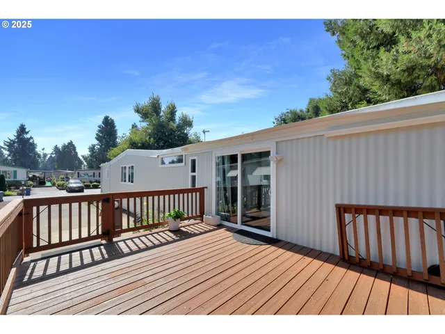 a view of a bench in the backyard