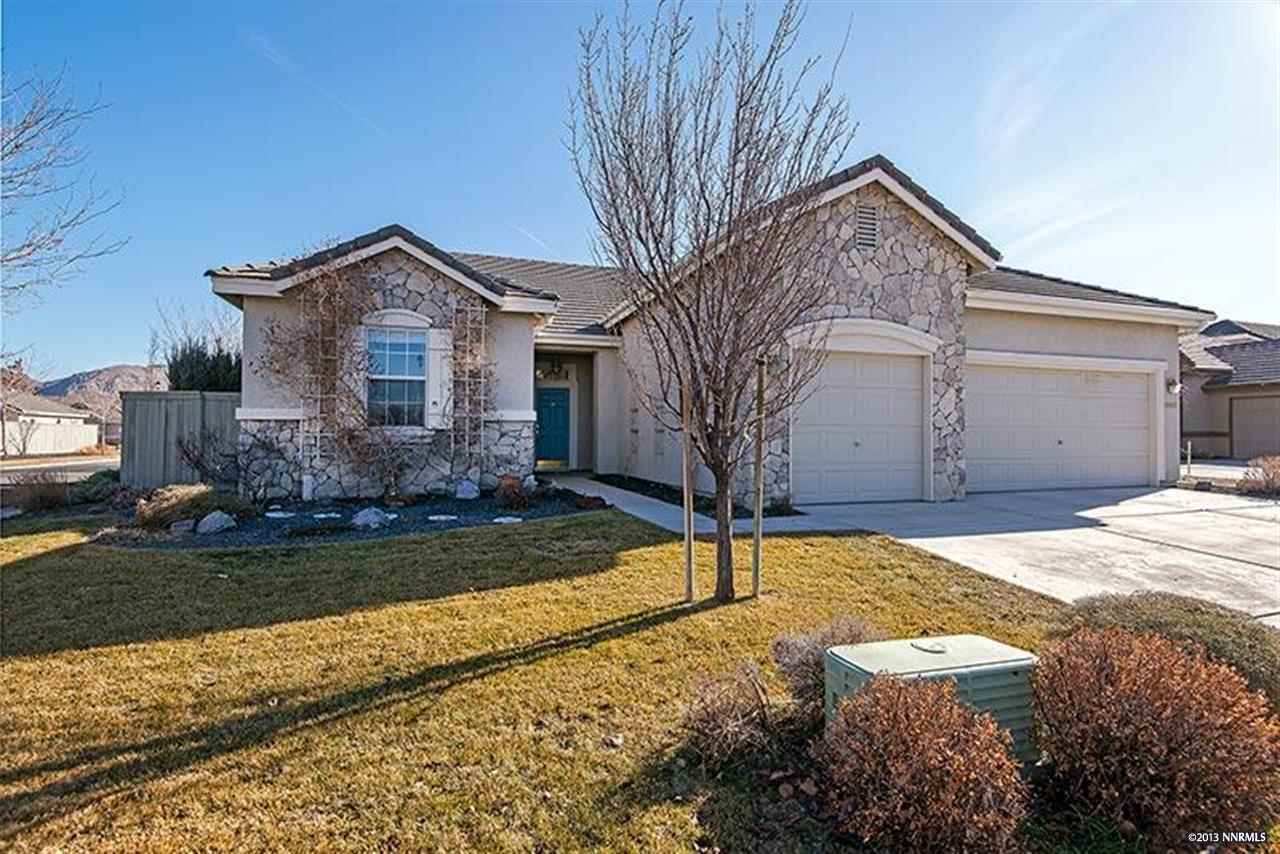 10402 Copper Wood Court Reno, NV 89521 - Photo 1 of 1 a front view of a house with a yard