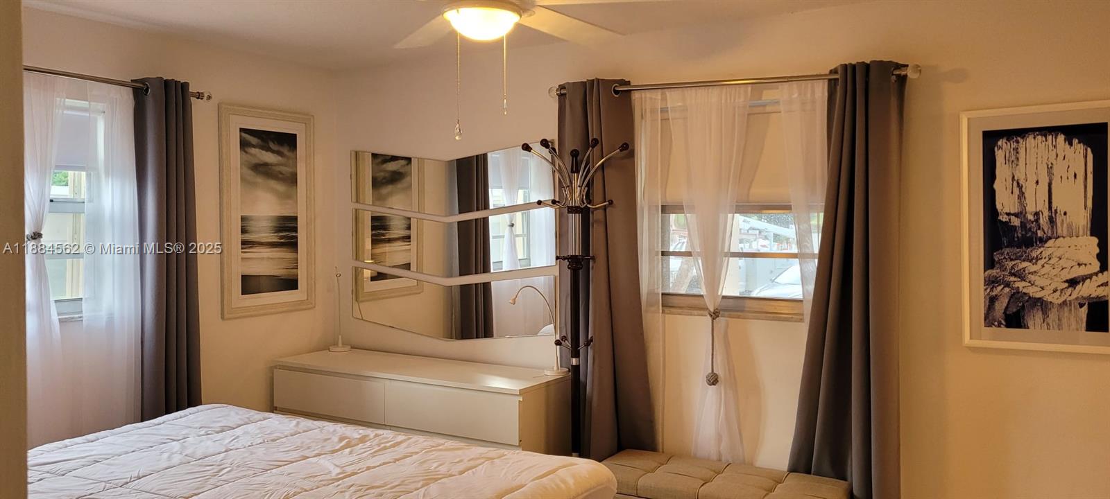 8425 Harding Avenue, Unit 1 Miami Beach, FL 33141 - Photo 7 of 16 a bathroom with a bathtub and a shower