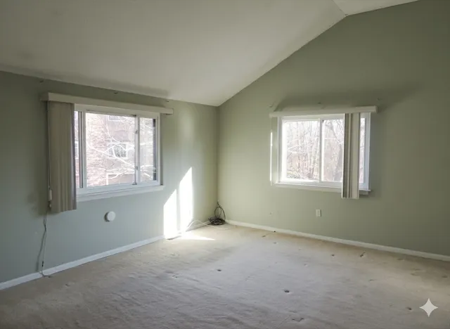 an empty room with windows