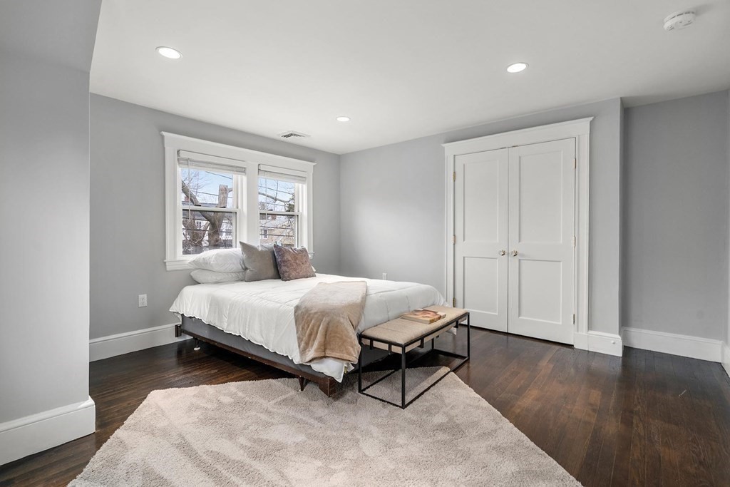 70 Falmouth Road Newton, MA 02465 - Photo 17 of 29 a bed room with a bed and a window