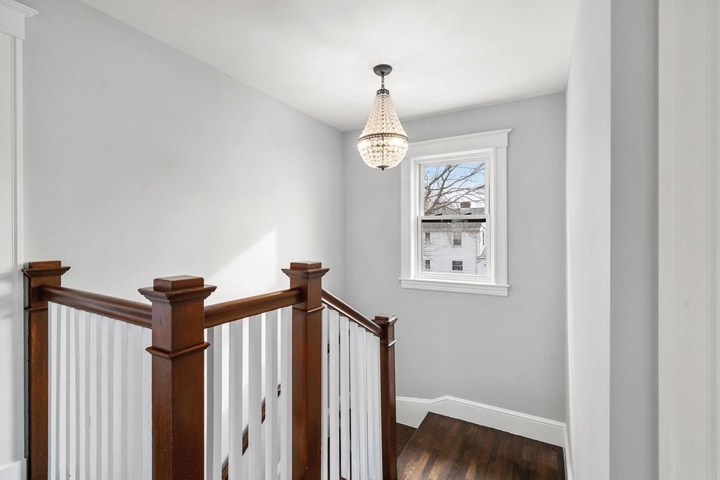 70 Falmouth Road Newton, MA 02465 - Photo 18 of 29 a view of a hallway to rooms