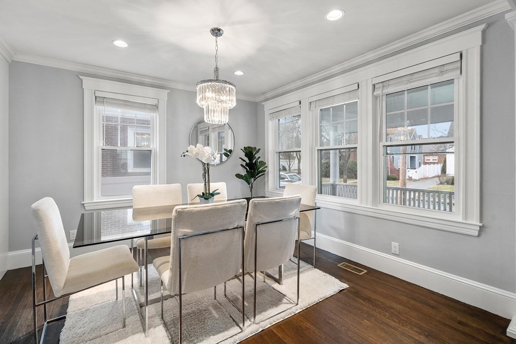 70 Falmouth Road Newton, MA 02465 - Photo 9 of 29 a view of a dining room with furniture wooden floor and chandelier