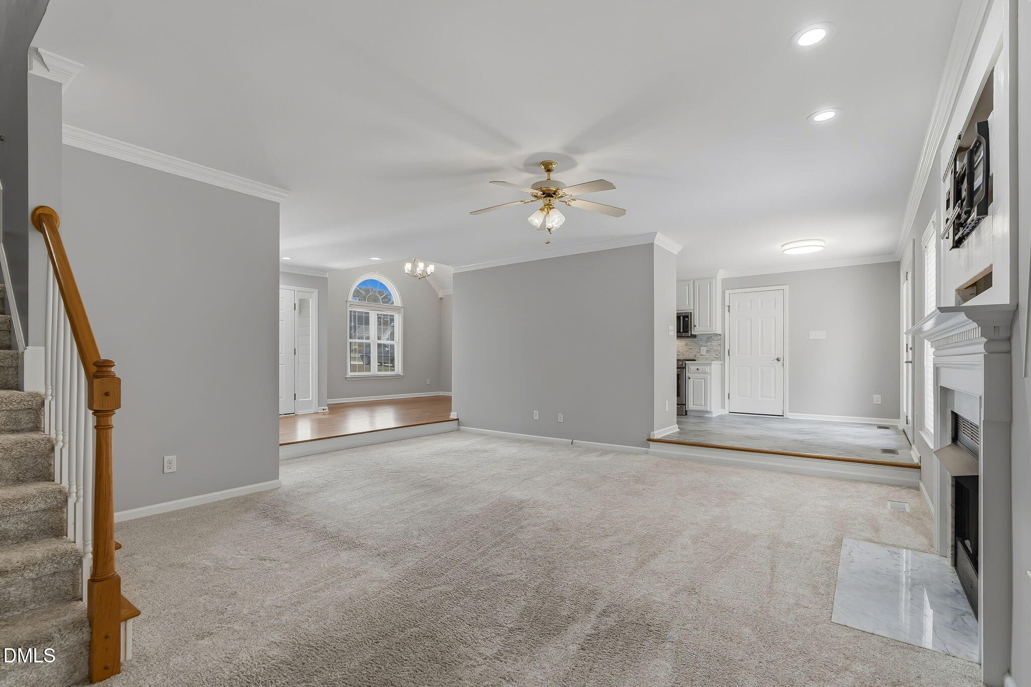 1112 Tyler Farms Drive Raleigh, NC 27603 - Photo 15 of 78 a view of an empty room with a fireplace