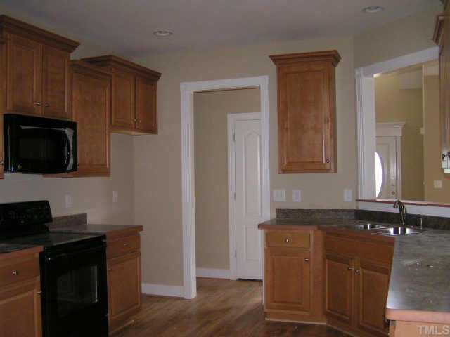 2458 Rolling Tracks Road Willow Spring, NC 27592 - Photo 4 of 10 Kitchen