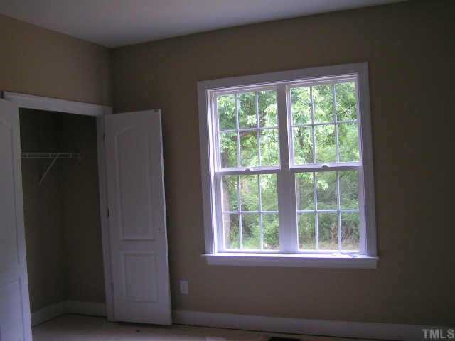2458 Rolling Tracks Road Willow Spring, NC 27592 - Photo 8 of 10 Bedroom 2