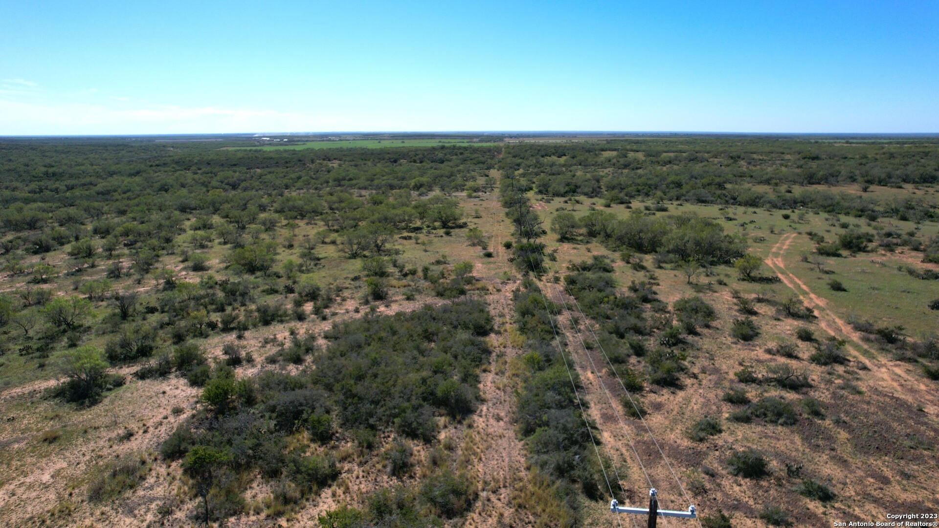 1913 County Road 3000 Pearsall, TX 78061 - Photo 15 of 38 an aerial view of residential houses with outdoor space