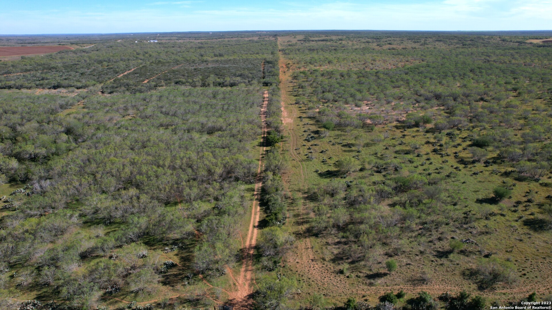 1913 County Road 3000 Pearsall, TX 78061 - Photo 27 of 38 a view of a green field