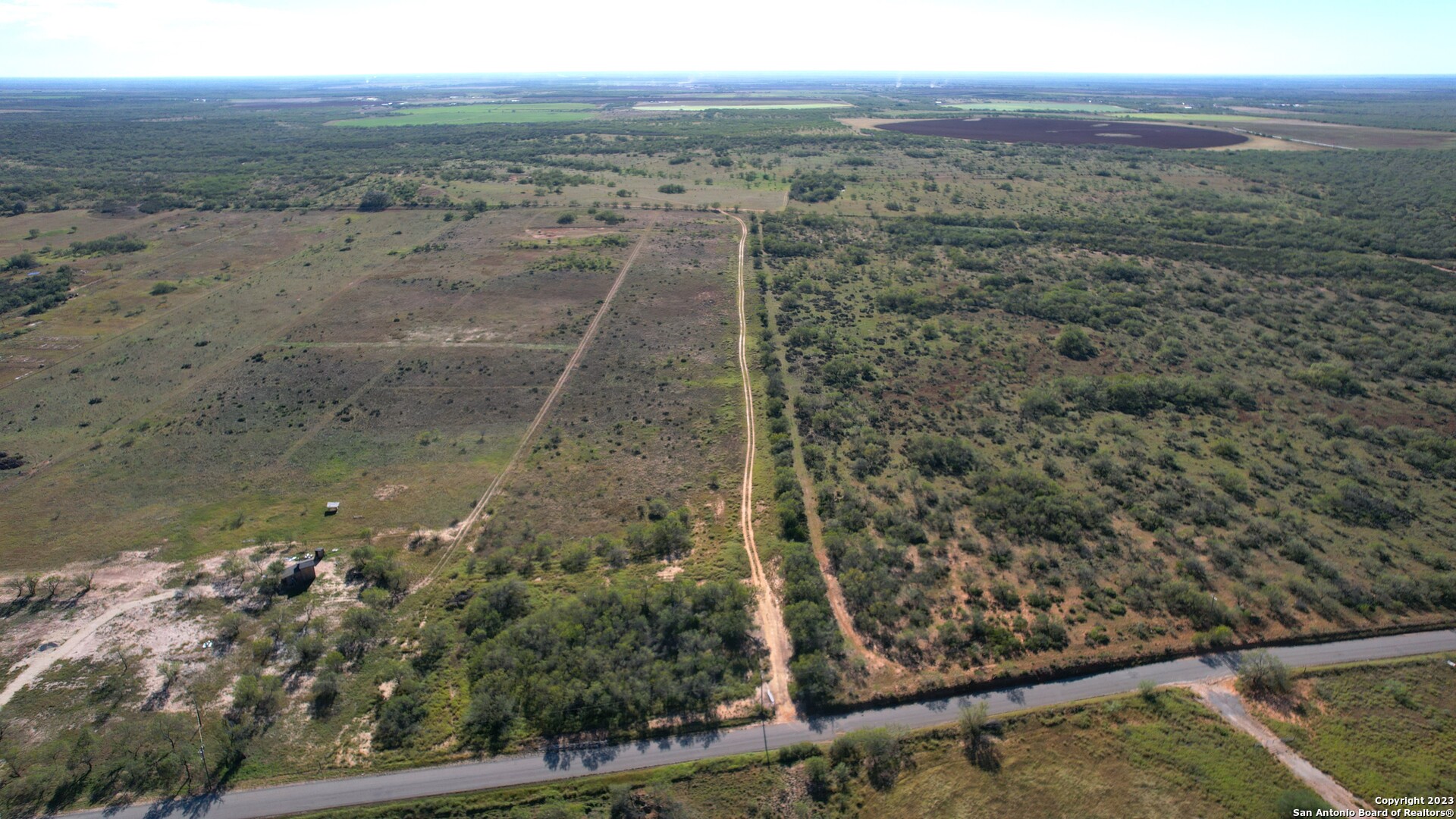 1913 County Road 3000 Pearsall, TX 78061 - Photo 3 of 38 a view of a lake with a mountain view