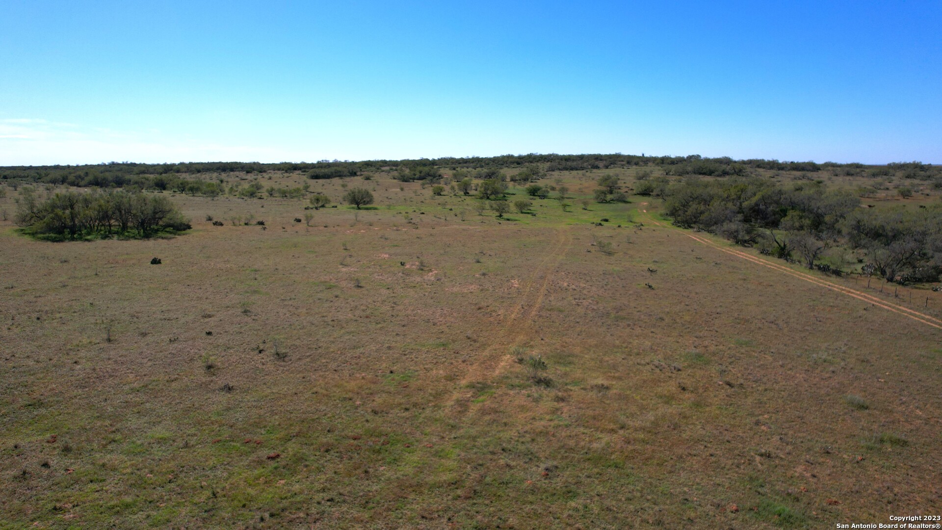 1913 County Road 3000 Pearsall, TX 78061 - Photo 9 of 38 a view of a dry field with an ocean view