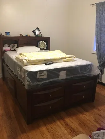 a bath tub sitting next to a bathroom