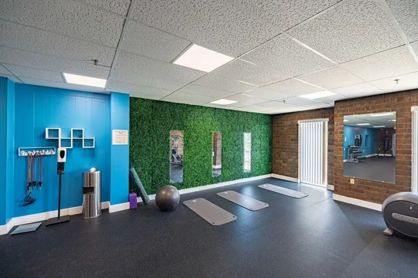a view of a room with gym equipment