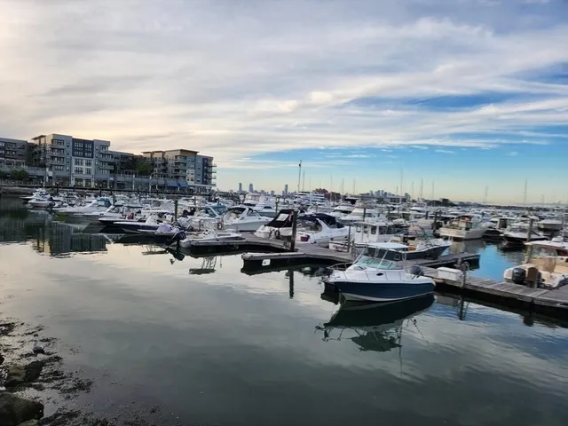 a view of a hallway with seating area