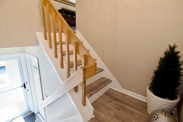 a room with a table and a mirror