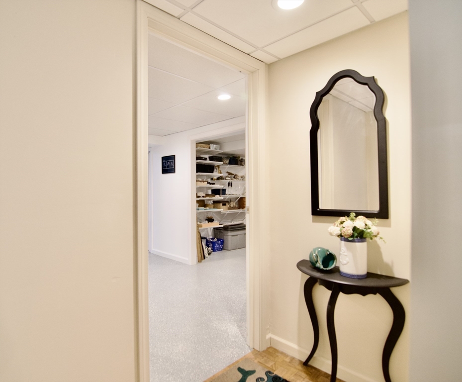 2205 Boston Road, Unit Q160 Wilbraham, MA 01095 - Photo 31 of 41 a room with a table and a mirror