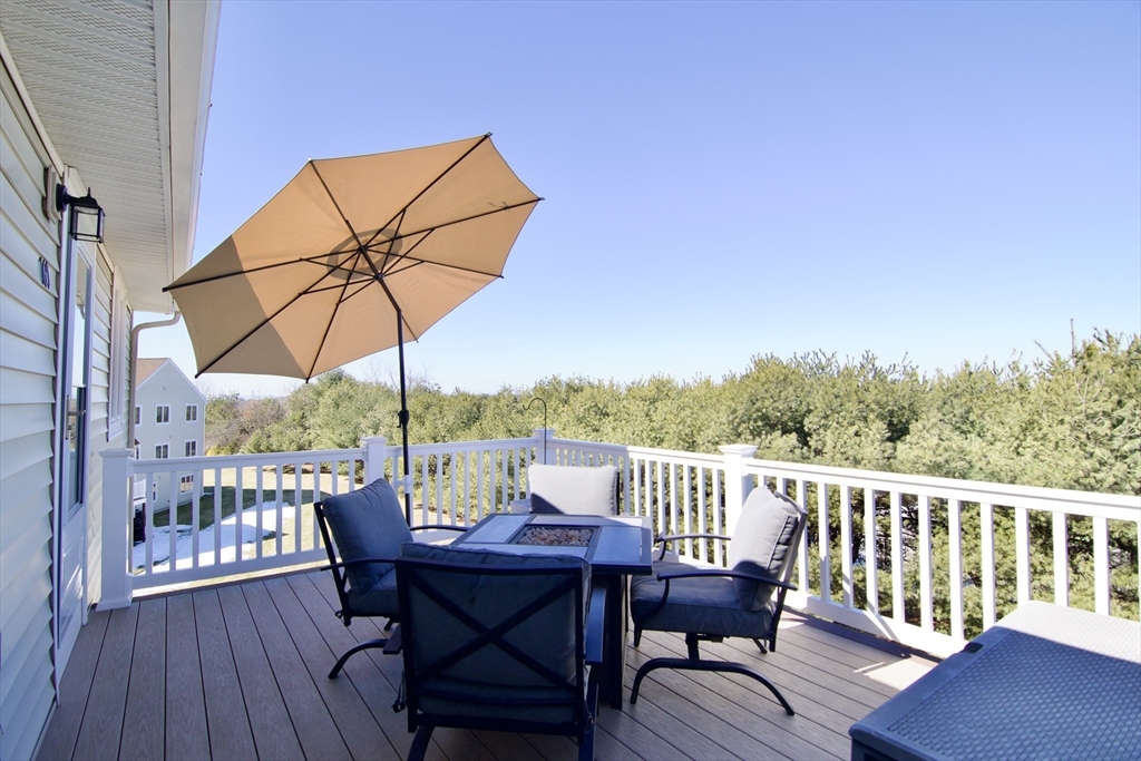 2205 Boston Road, Unit Q160 Wilbraham, MA 01095 - Photo 35 of 41 a view of a chair and table on the deck