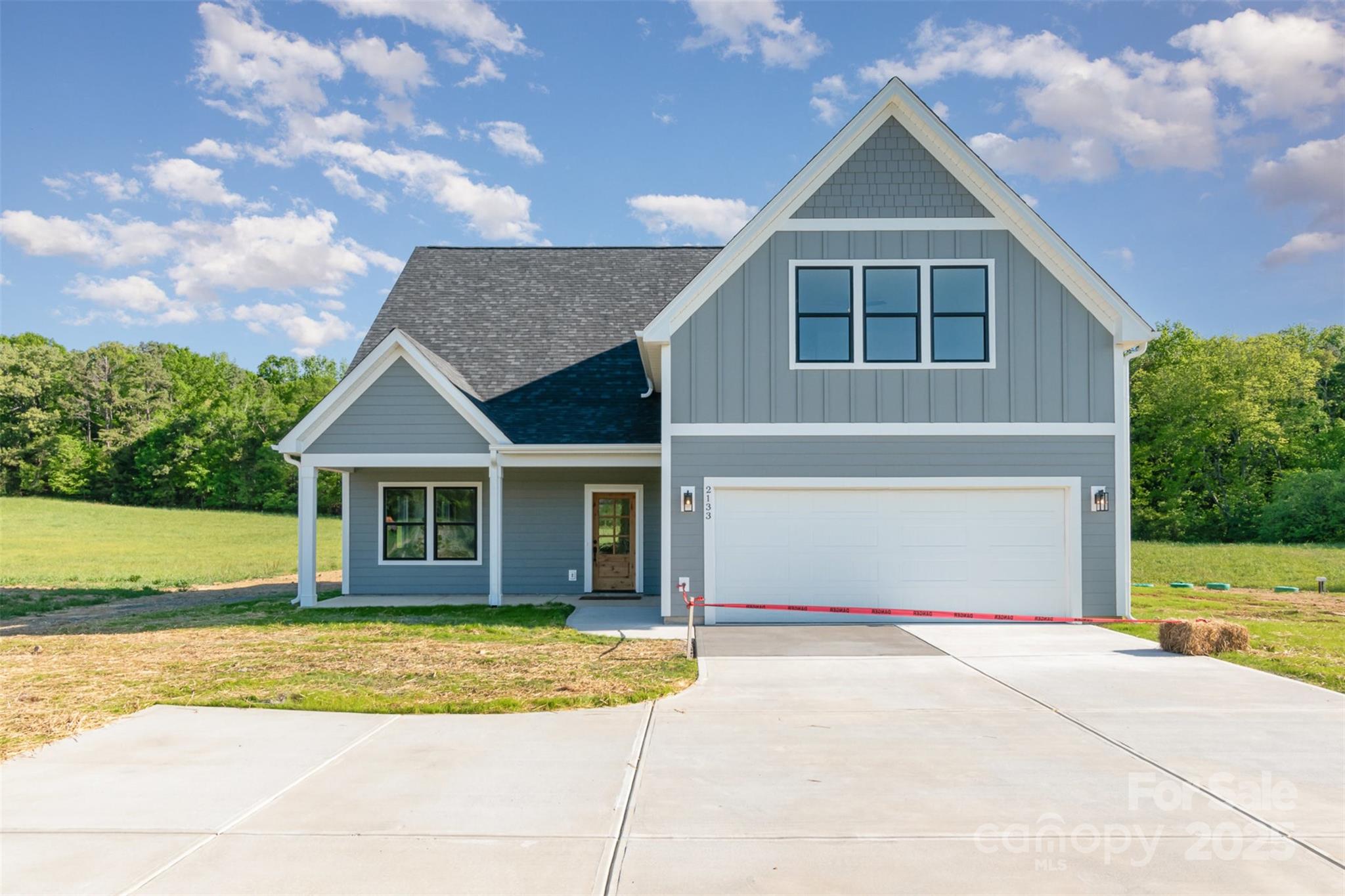 2133 Tite Road Stanfield, NC 28163 - Photo 1 of 35 a front view of a house with a yard