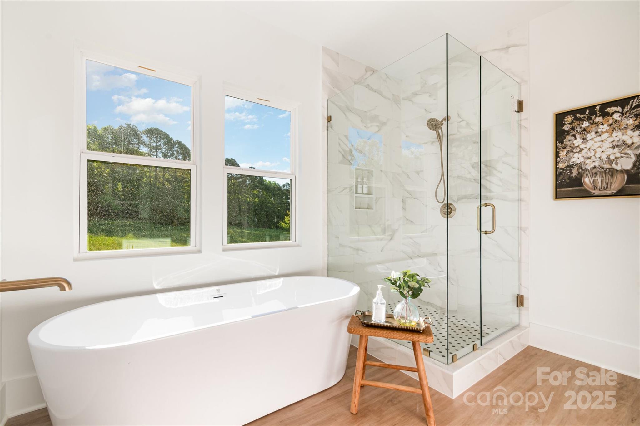 2133 Tite Road Stanfield, NC 28163 - Photo 17 of 35 a white bath tub sitting next to a window