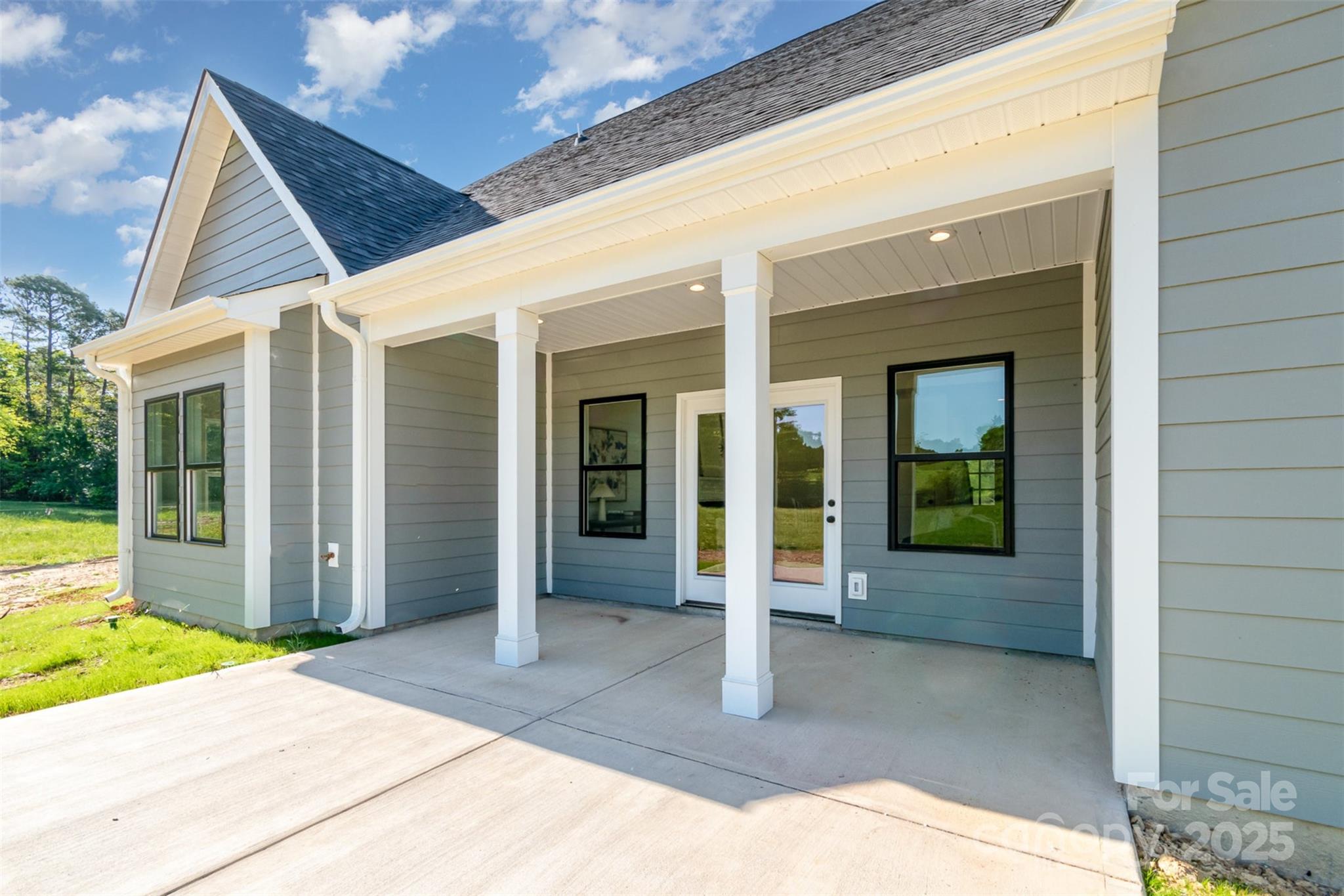 2133 Tite Road Stanfield, NC 28163 - Photo 28 of 35 a front view of a house with a porch