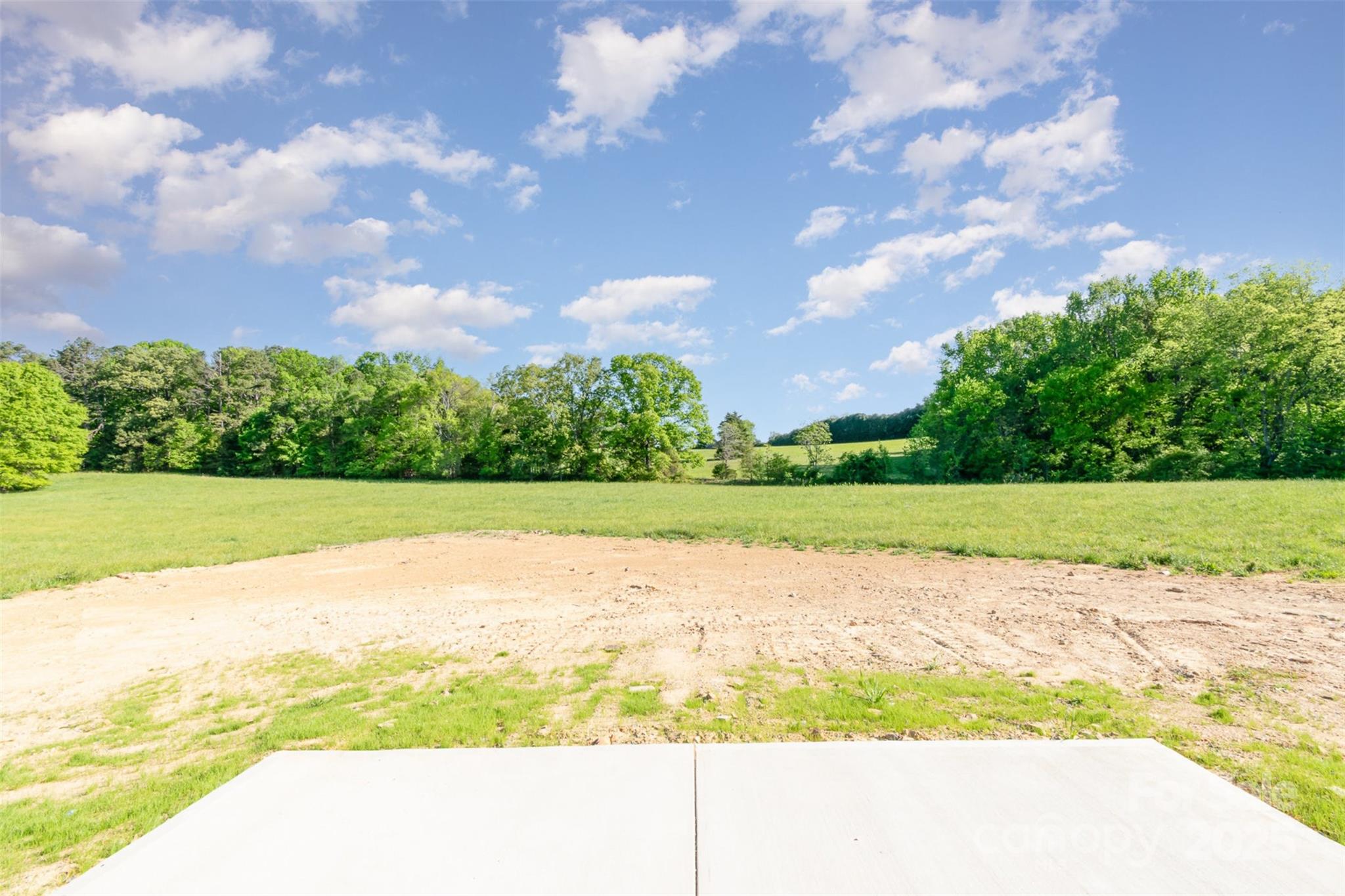 2133 Tite Road Stanfield, NC 28163 - Photo 30 of 35 a view of yard with swimming pool and green space