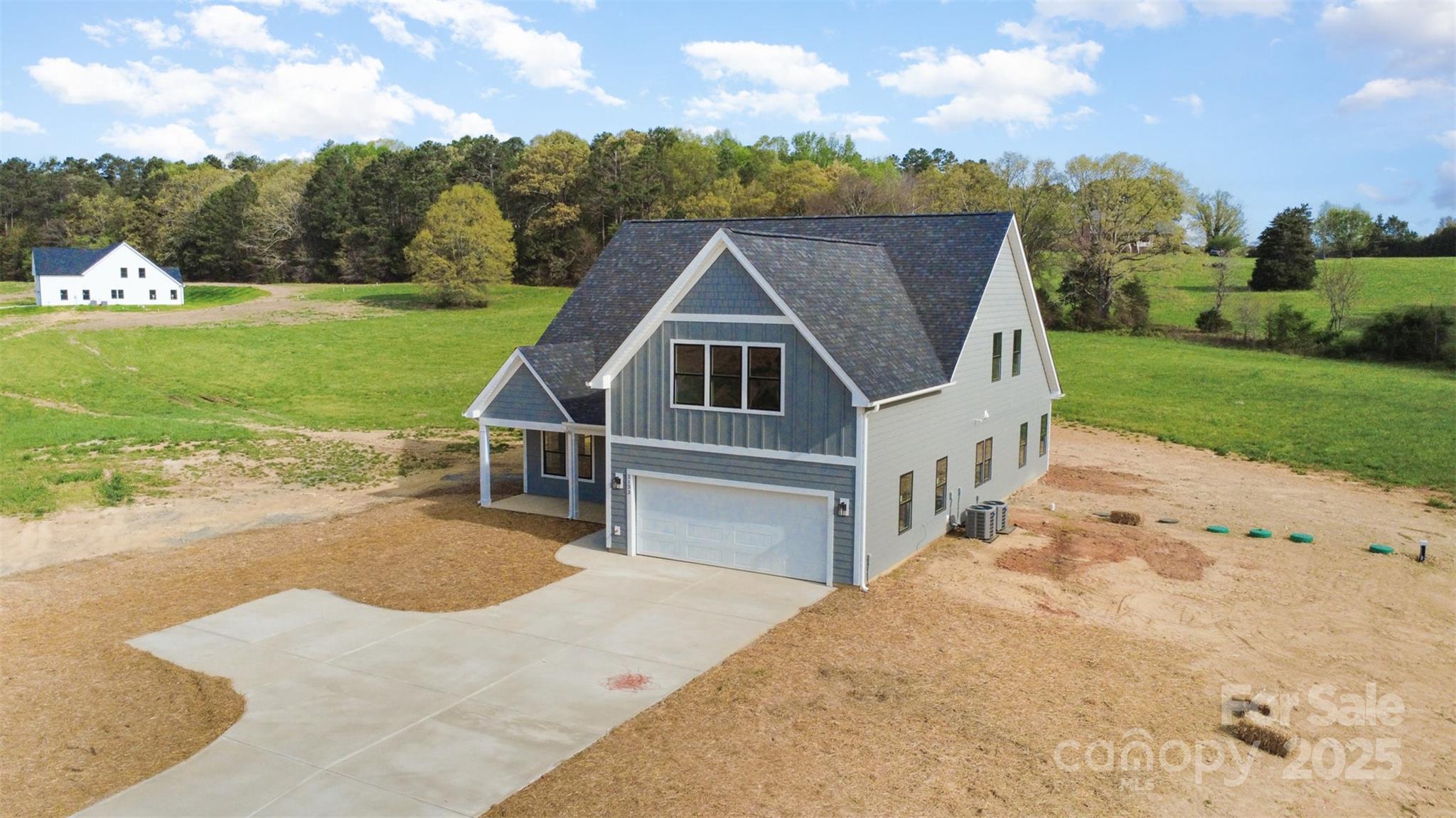 2133 Tite Road Stanfield, NC 28163 - Photo 33 of 35 front view of a house with a yard