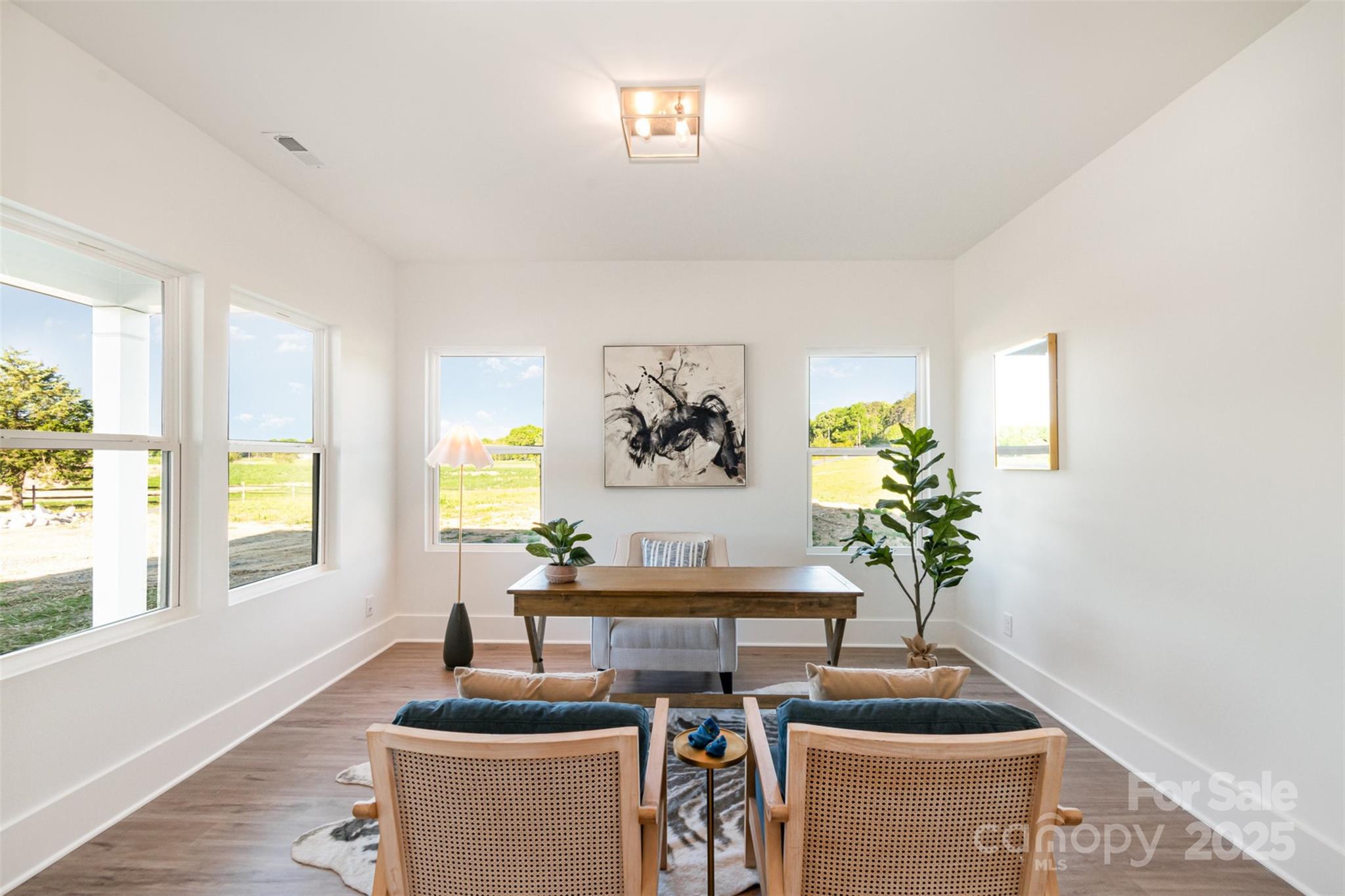 2133 Tite Road Stanfield, NC 28163 - Photo 5 of 35 a living room with furniture and a potted plant