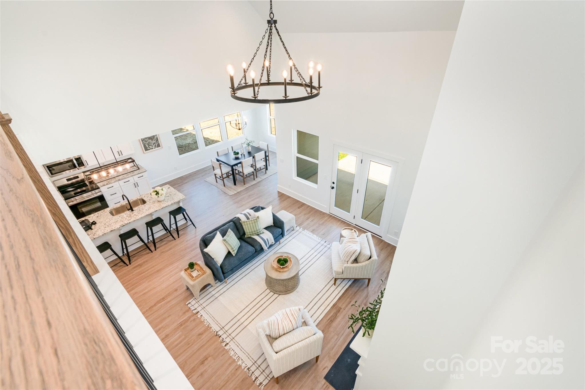 2133 Tite Road Stanfield, NC 28163 - Photo 8 of 35 a view of a dining room with furniture wooden floor and chandelier