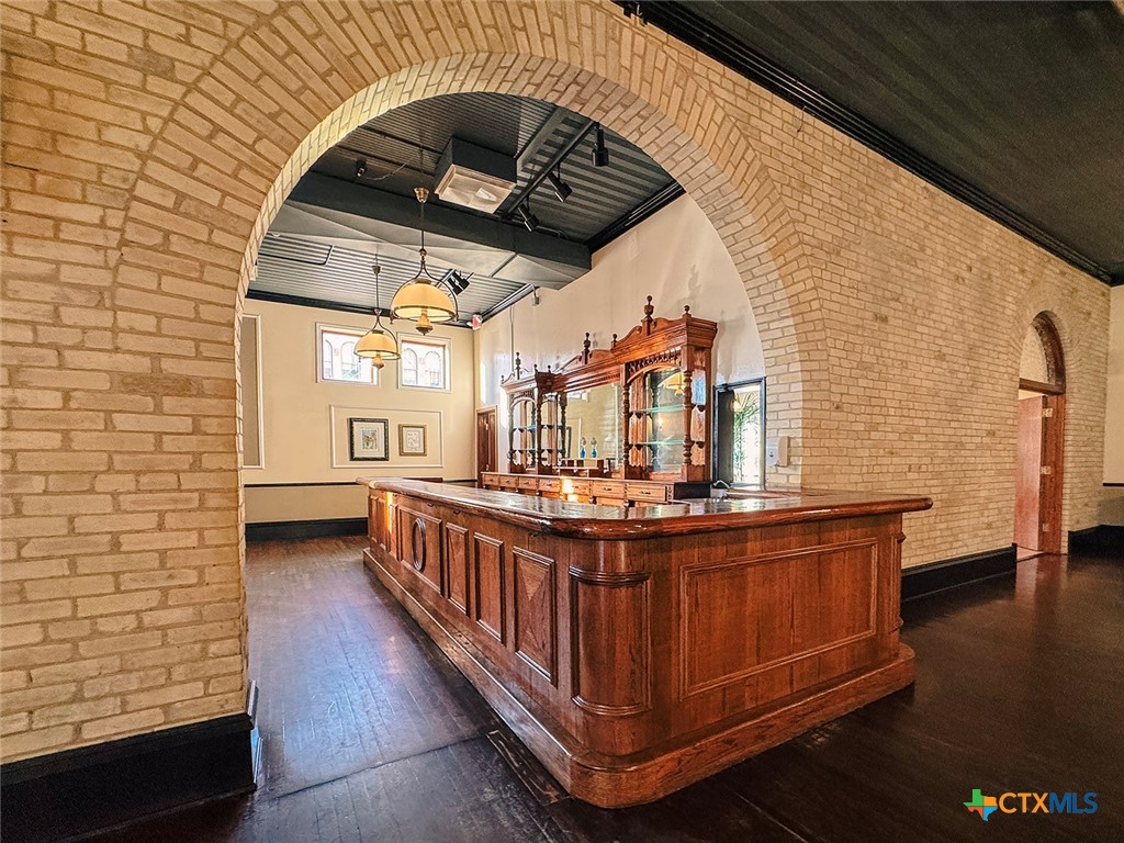 202 East Forrest Street Victoria, TX 77901 - Photo 13 of 47 a view of a chairs and table in the balcony