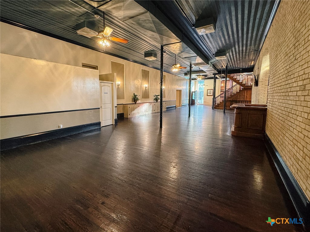 202 East Forrest Street Victoria, TX 77901 - Photo 14 of 47 a view of empty room with wooden floor