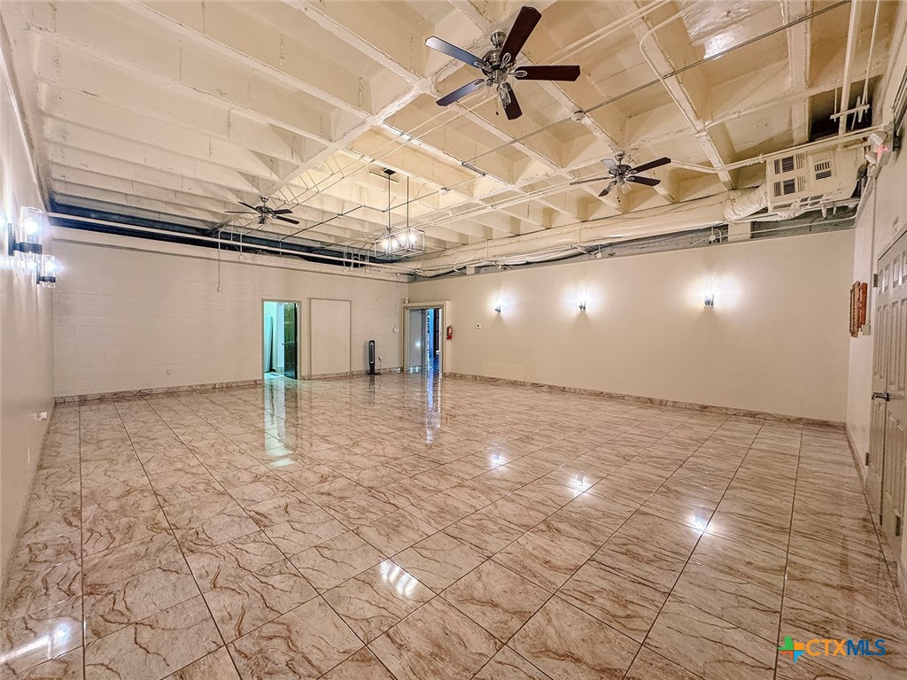 202 East Forrest Street Victoria, TX 77901 - Photo 16 of 47 a view of a room with wooden floor