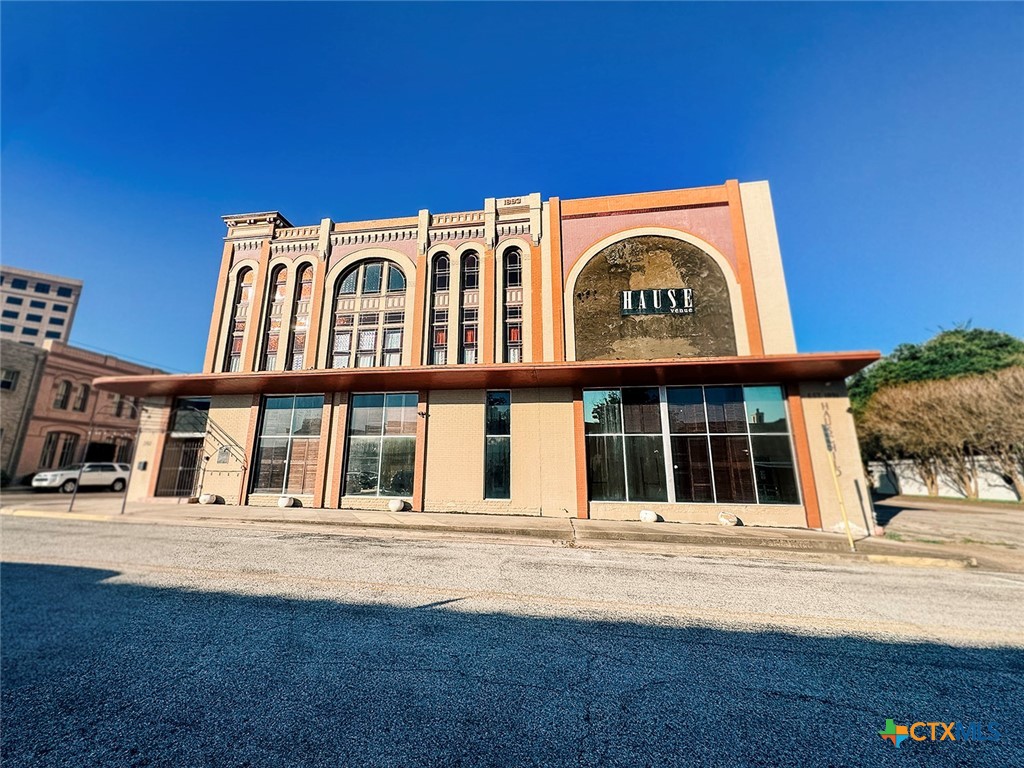 202 East Forrest Street Victoria, TX 77901 - Photo 2 of 47 a front view of a building with a garden