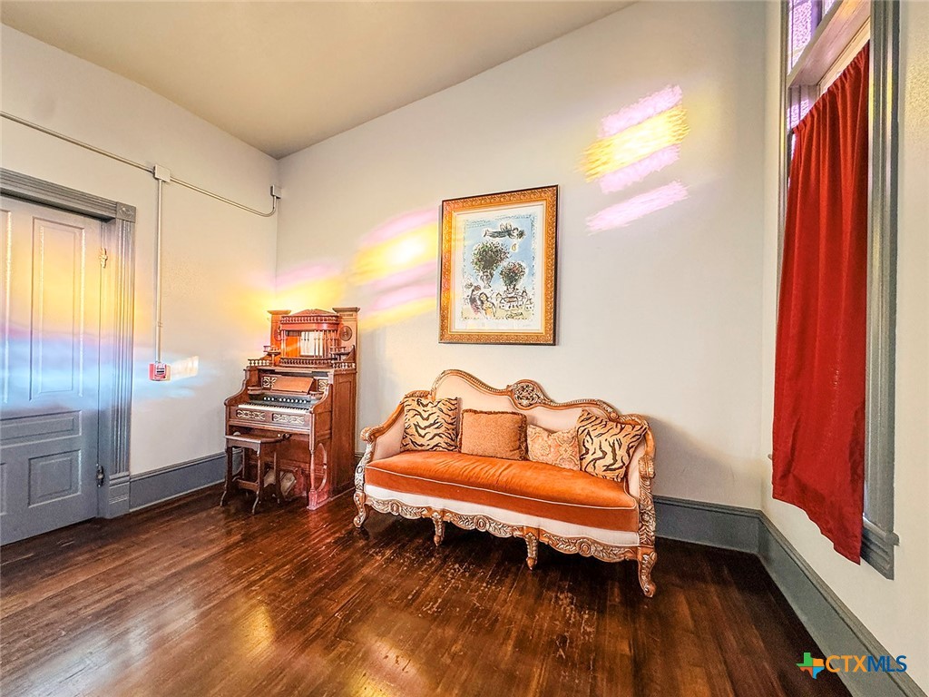 202 East Forrest Street Victoria, TX 77901 - Photo 35 of 47 a couch sitting in a room next to a window