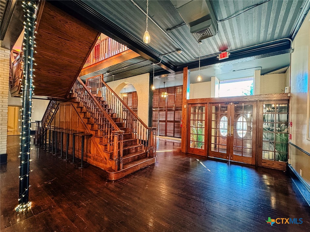 202 East Forrest Street Victoria, TX 77901 - Photo 5 of 47 a view of entryway with wooden floor
