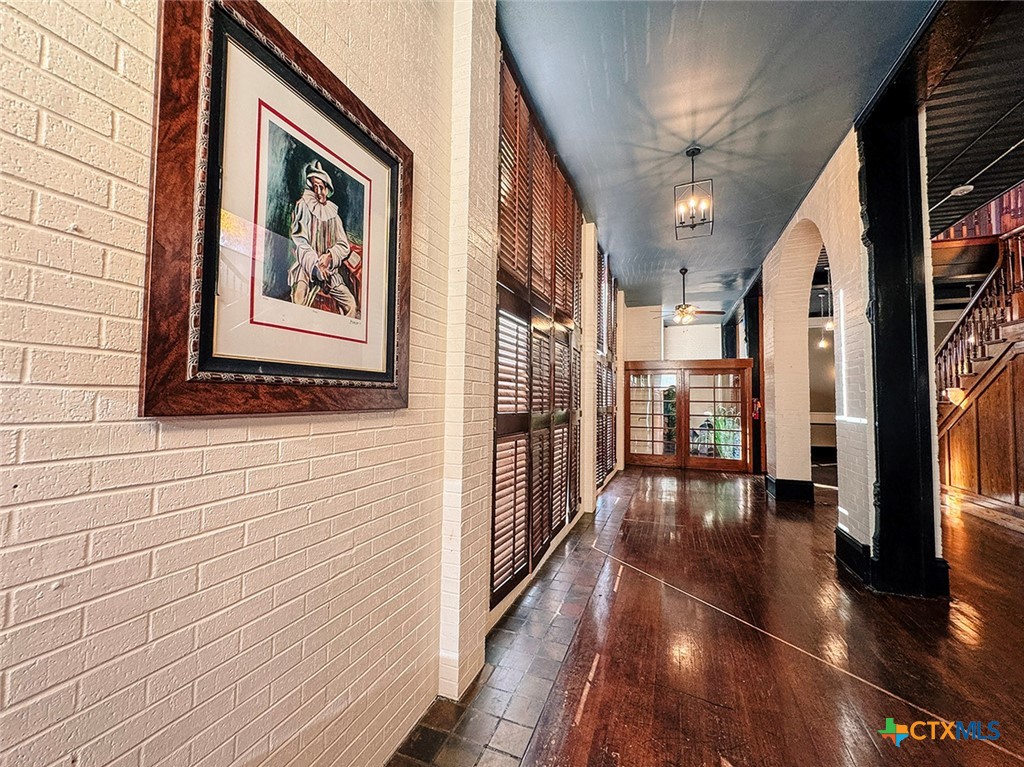 202 East Forrest Street Victoria, TX 77901 - Photo 6 of 47 a view of an entryway with wooden floor