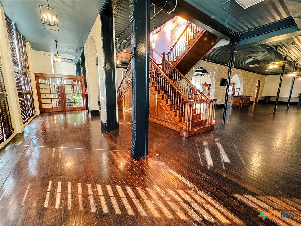 202 East Forrest Street Victoria, TX 77901 - Photo 7 of 47 a view of entryway with wooden floor