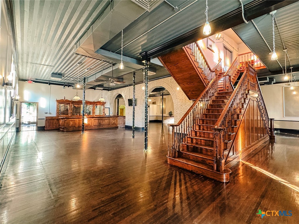 202 East Forrest Street Victoria, TX 77901 - Photo 9 of 47 a view of entryway and hall with wooden floor