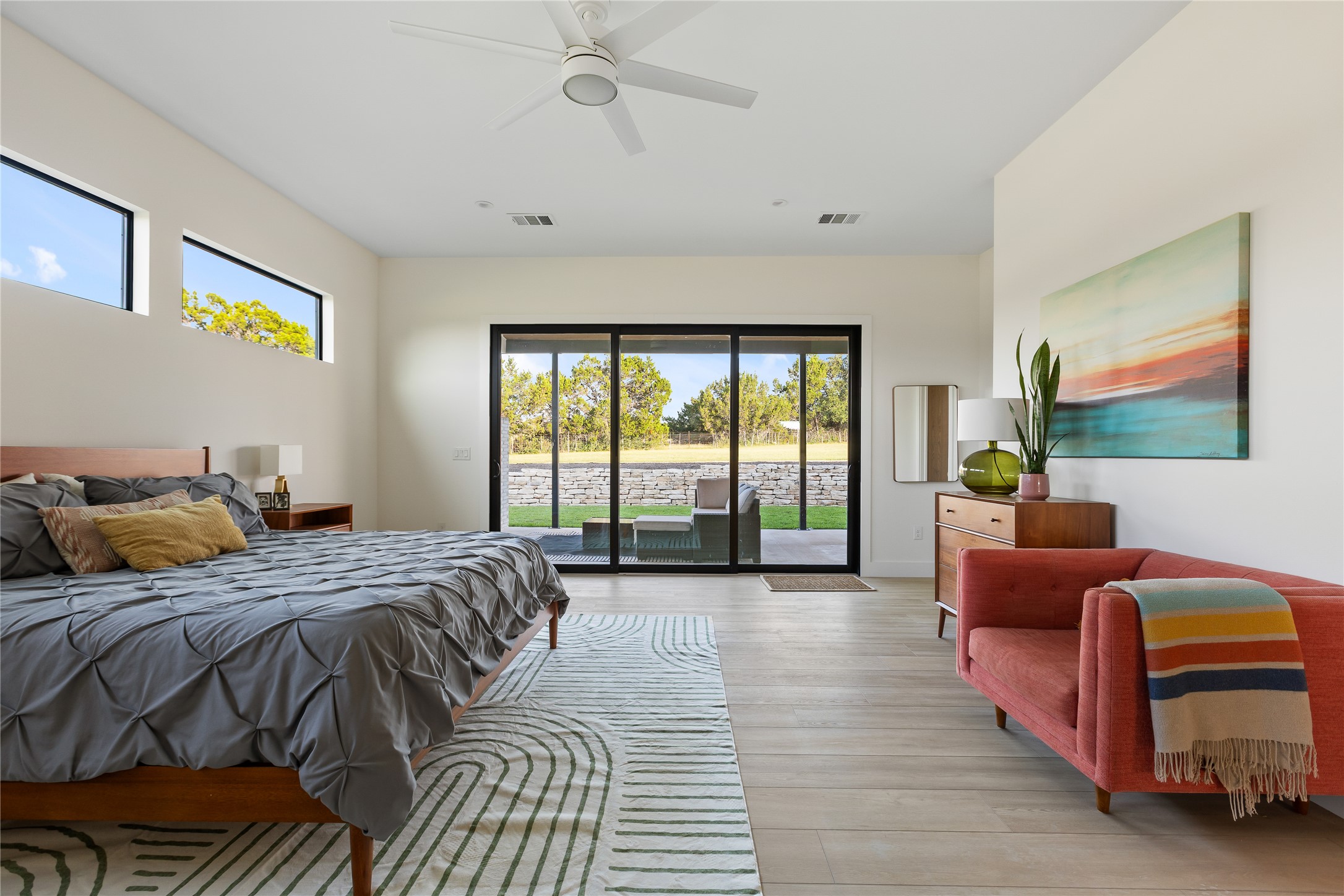 402 Rolling Hills Road Liberty Hill, TX 78642 - Photo 12 of 40 Huge primary bedroom with sliders to the back patio
