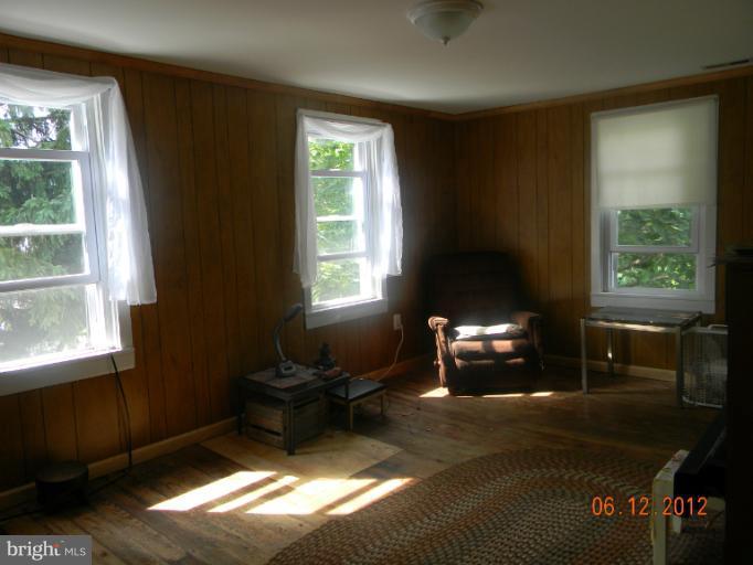 3525 Young Road Manchester, MD 21102 - Photo 11 of 26 a living room with furniture and a window