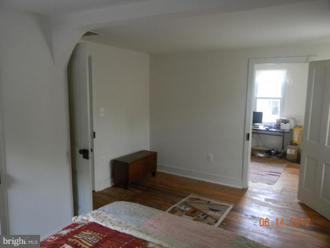 3525 Young Road Manchester, MD 21102 - Photo 12 of 26 a bedroom with a bed and a view of bathroom
