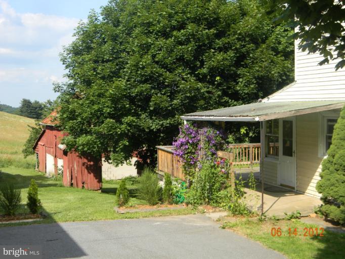 3525 Young Road Manchester, MD 21102 - Photo 25 of 26 a front view of a house with garden
