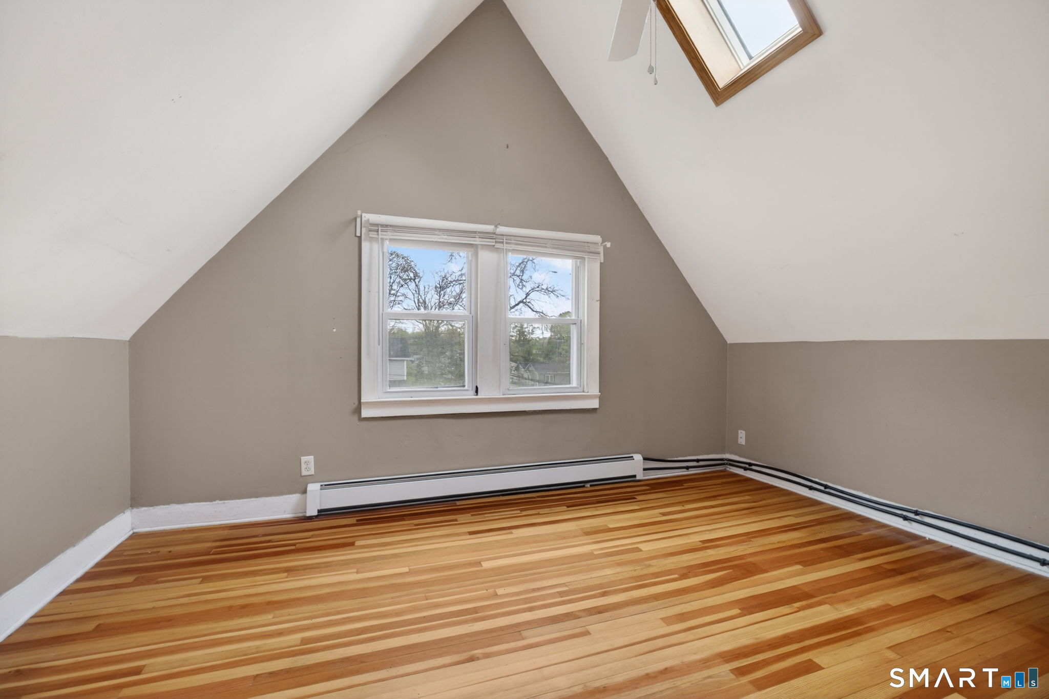 670 Hanover Road Meriden, CT 06451 - Photo 38 of 40 a view of a room with wooden floor and white walls