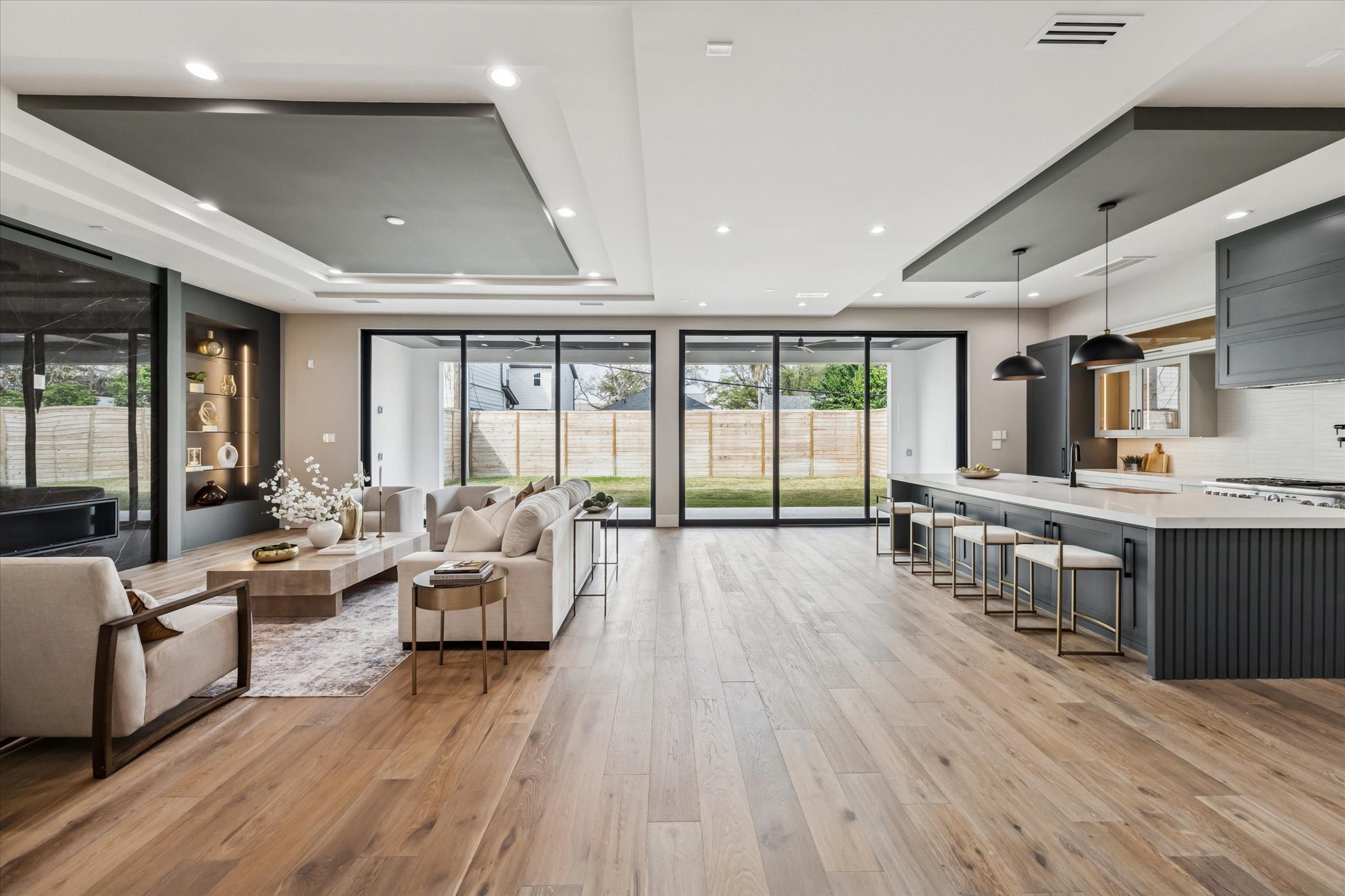 2120 Branard Street Houston, TX 77098 - Photo 5 of 33 a living room with furniture a large window and wooden floor