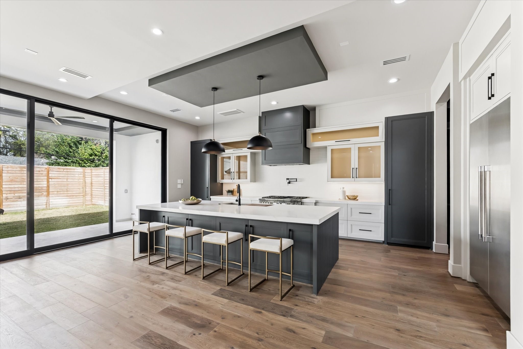 2120 Branard Street Houston, TX 77098 - Photo 9 of 33 a large kitchen with a table and chairs in it