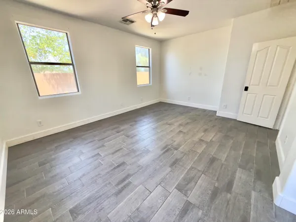 a bathroom with a bathtub a mirror a sink and a shower