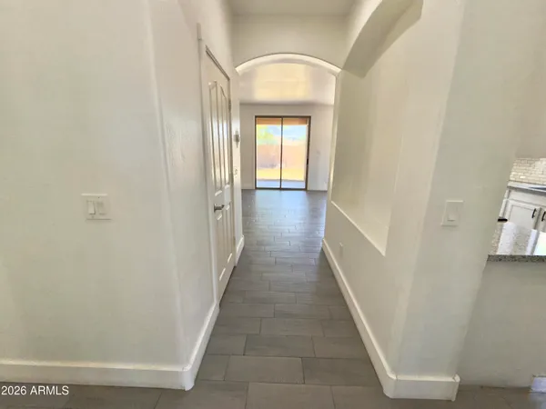 a kitchen with a stove a sink and a microwave