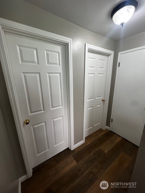 2716 South 258th Place Kent, WA 98032 - Photo 4 of 11 an empty room with wooden floor