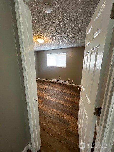 2716 South 258th Place Kent, WA 98032 - Photo 5 of 11 a view of room with window and stairs