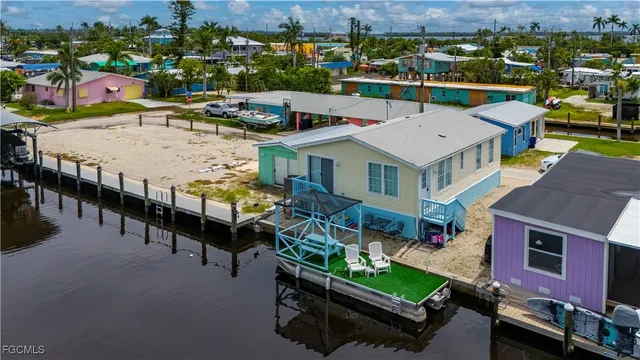 an aerial view of a houses with outdoor space